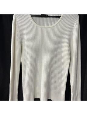 George ribbed knit sweater in a soft ivory/tusk color.